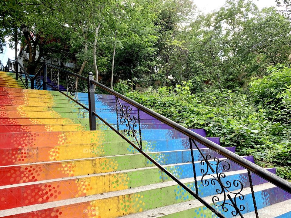 Rainbow colored stairs in the city - LGBTQIA colors