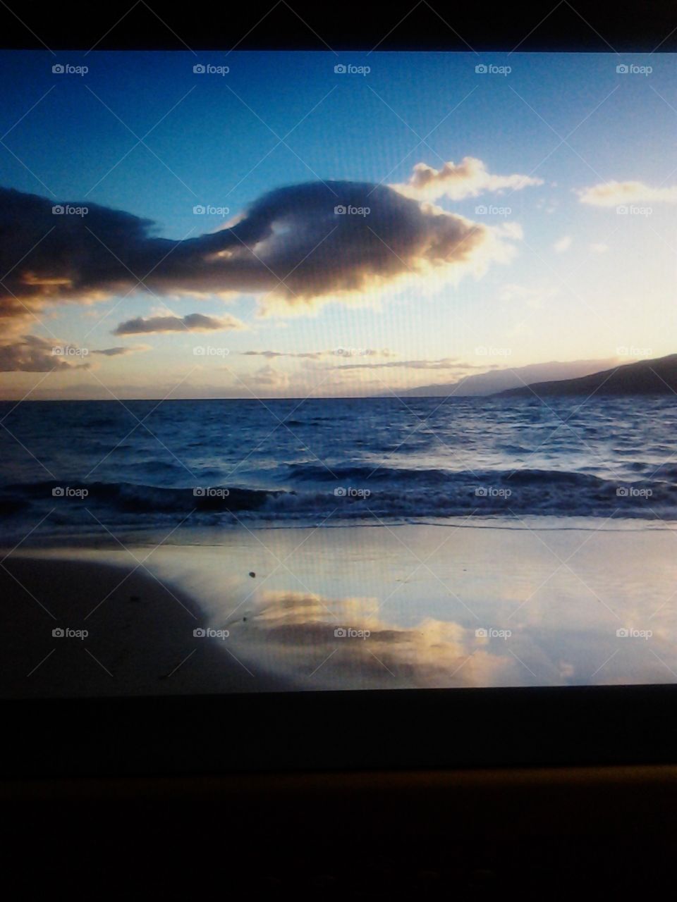 Re flexion. On the beach in Maui after the Sun has gone down taking in the beauty