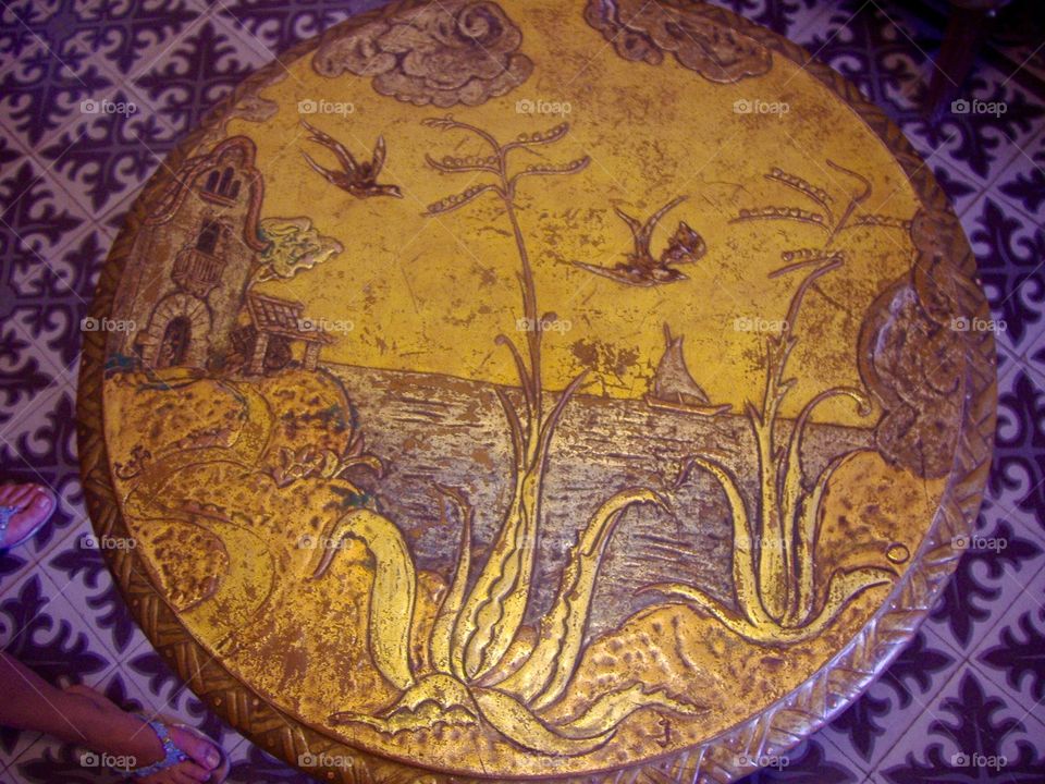 A stand with ornament