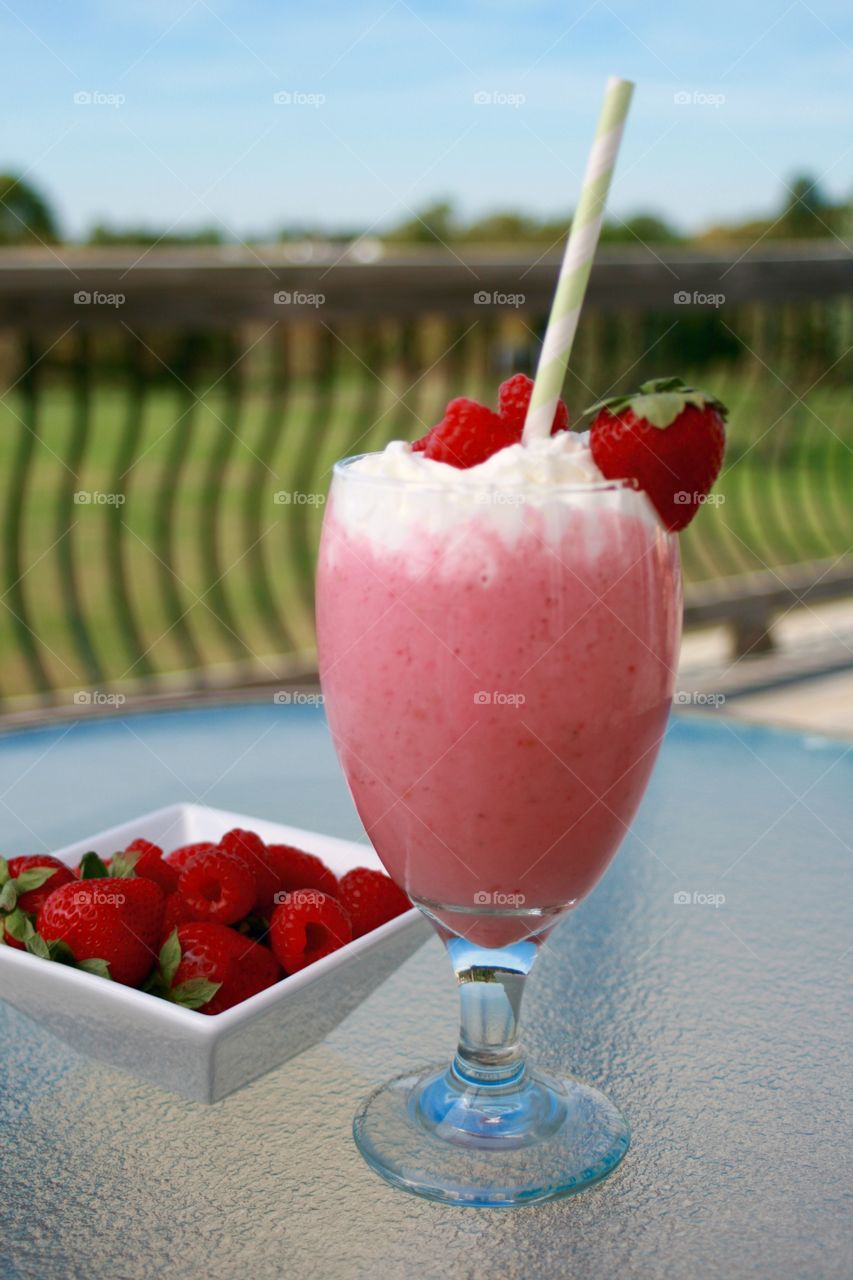 Think Pink. Fresh strawberry and raspberry smoothie 
