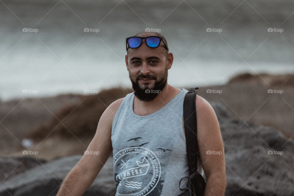 Boy walking on beach