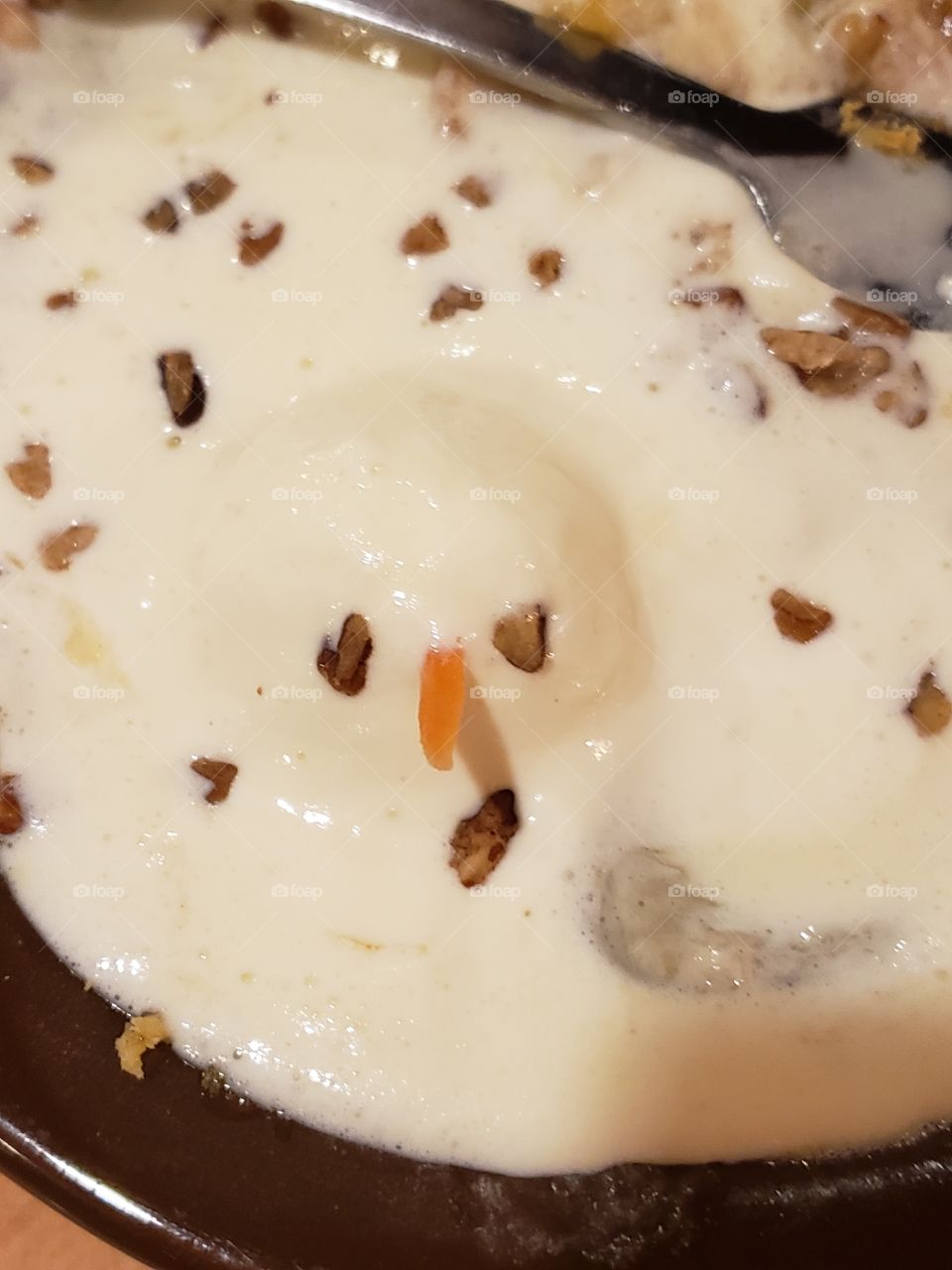 Melted ice cream looks like a Snowman