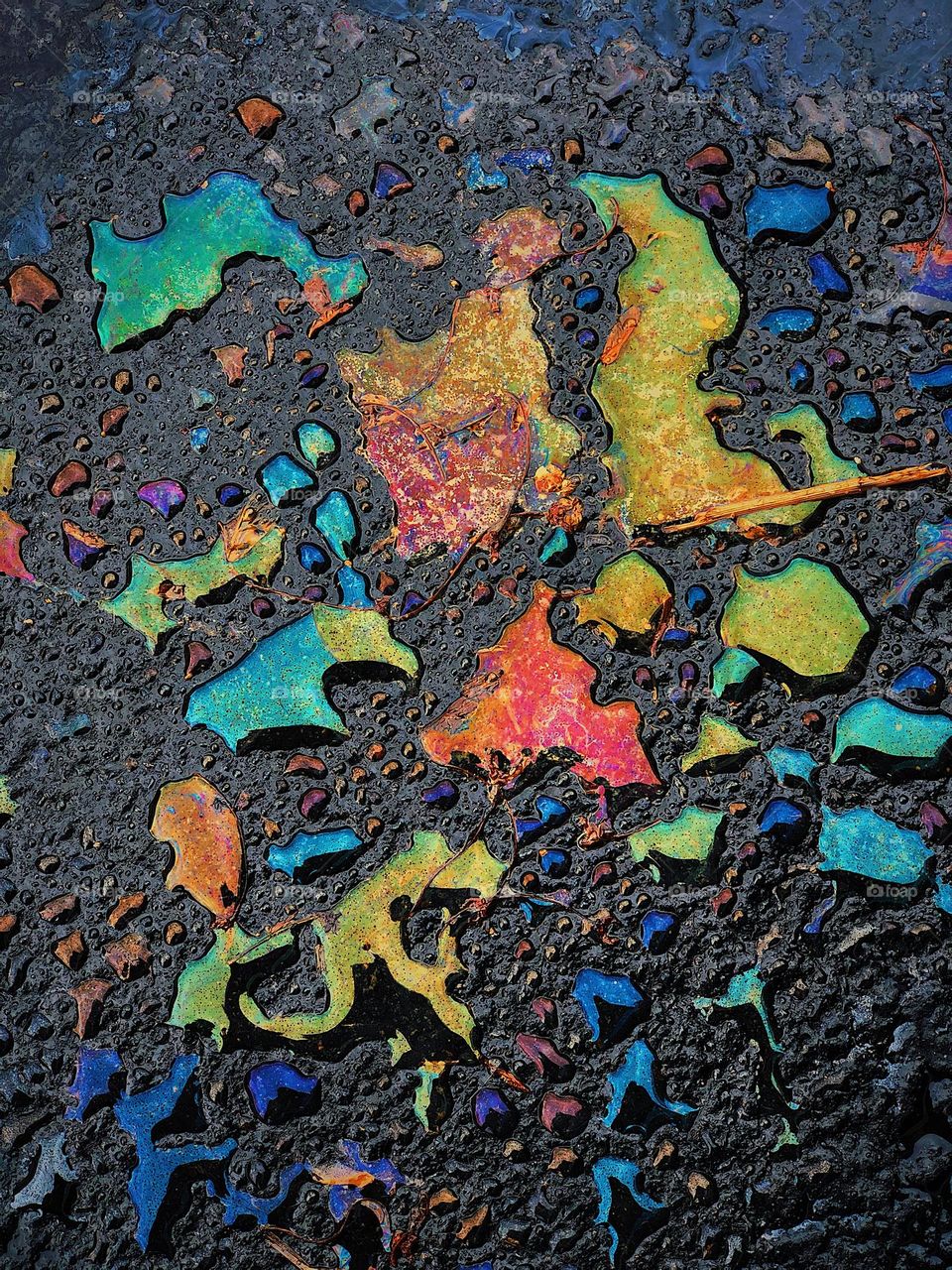 Oil on the pavement, parking lot pretty, beautiful messes, oil and water, pavement spills, colorful messes 