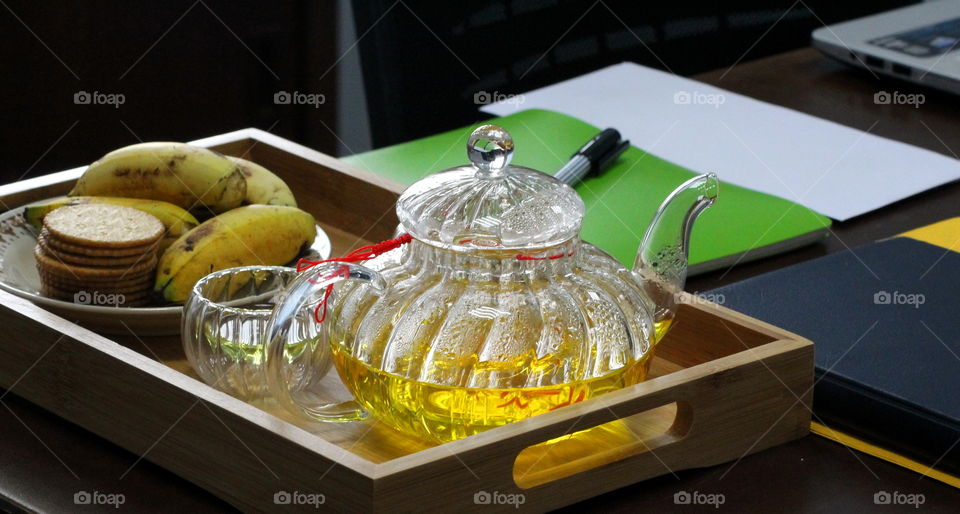 Starting my morning routines with Chinese tea, some bananas and biscuit. Enough to boost my energy.