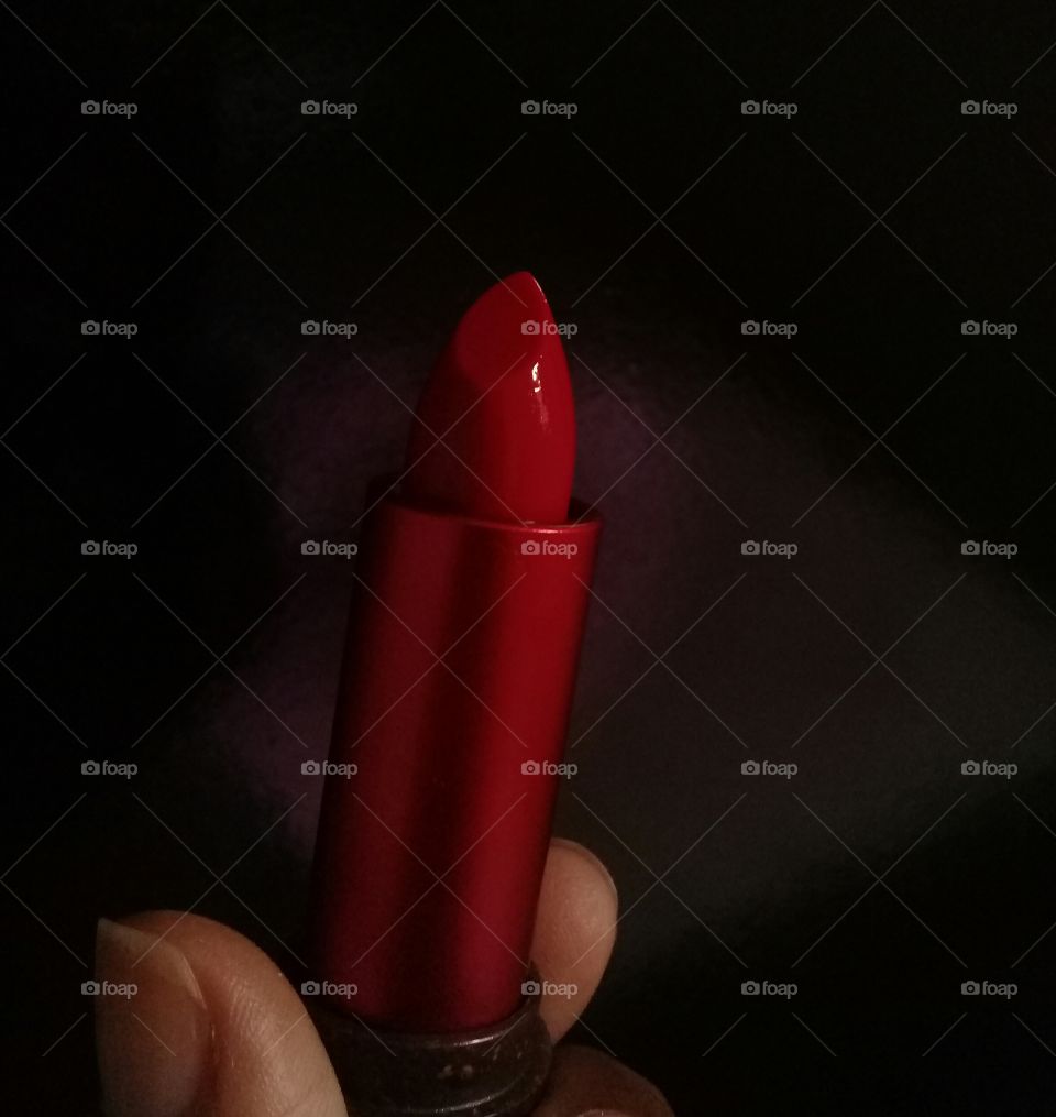 Red lipstick. Each woman nedds one.
