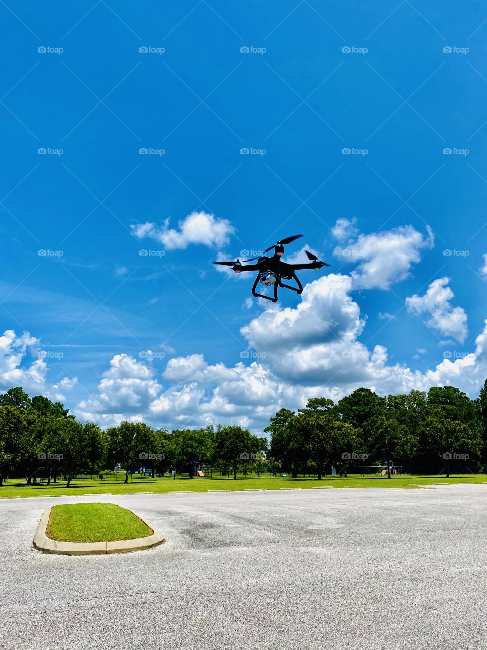 Drone in flight under a blue sky