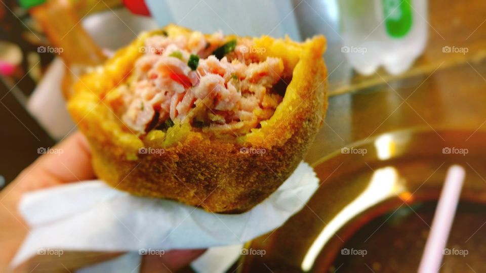 Close-up of person holding snack