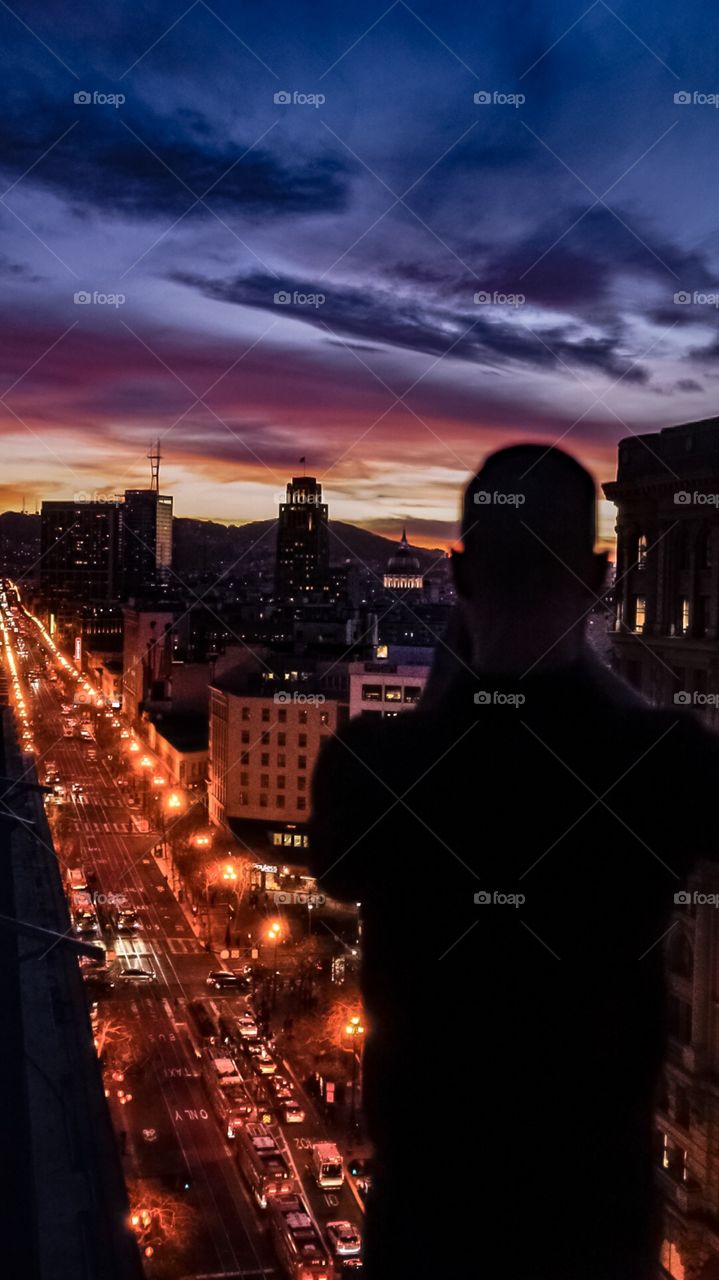 Over the shoulder shot of the beautiful downtown market st Shopping district in San Francisco California