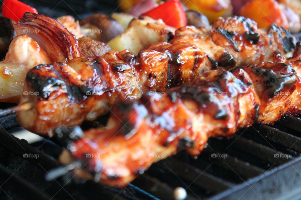Grilled spicy meat on skewers