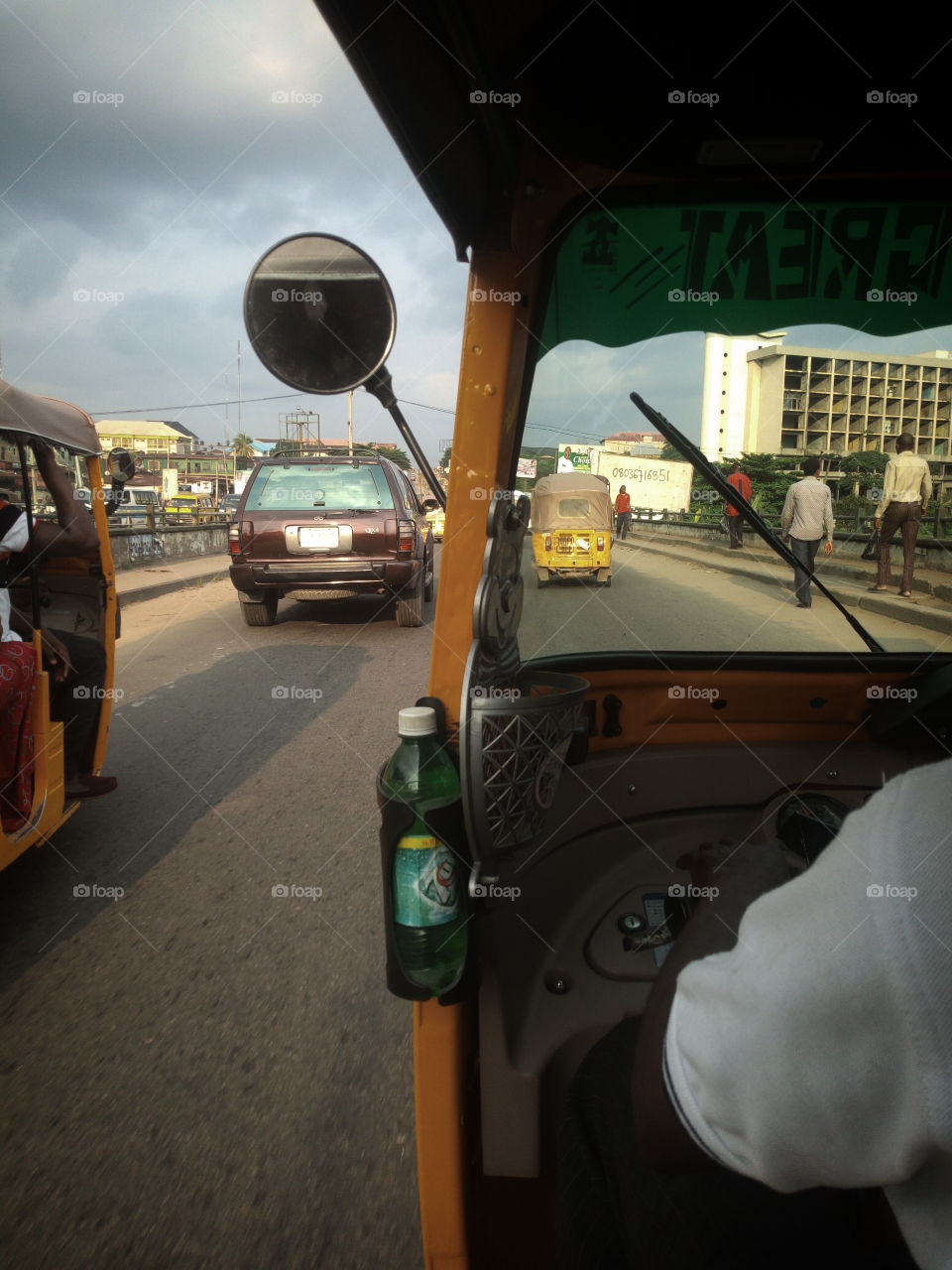 riding a keke(tricycle) in Eastern Nigeria