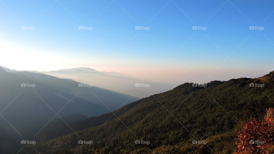 Grassy mountains at foggy weather