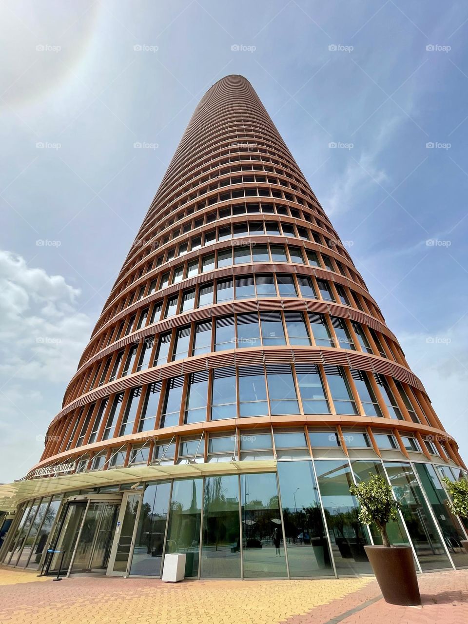 Low corner view of Sevilla Tower, Andalusia highest skyscraper and Sevilla highest building 