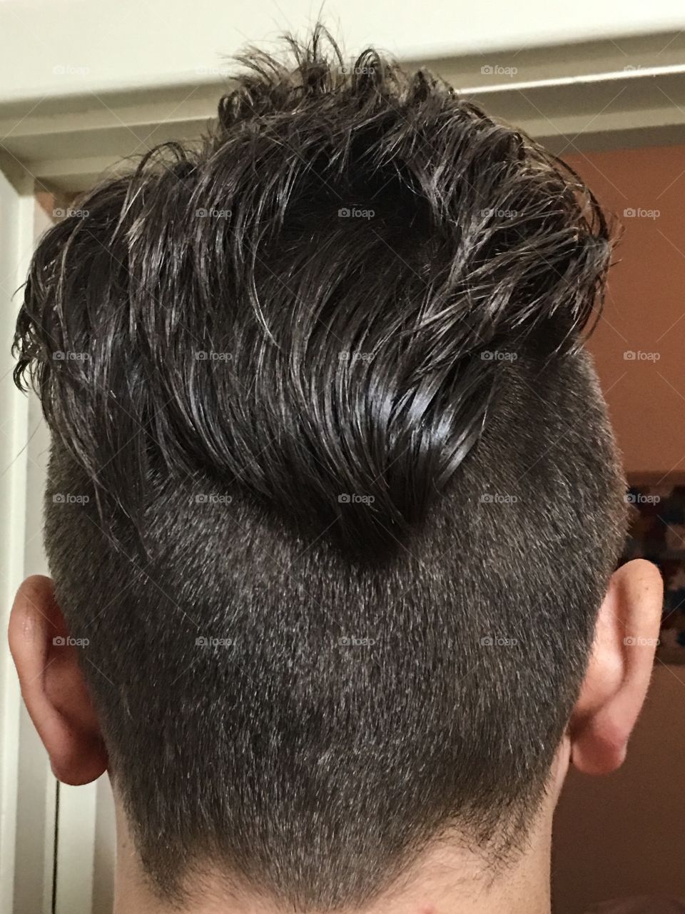 Men's hair style view from
Back closeup modern styles