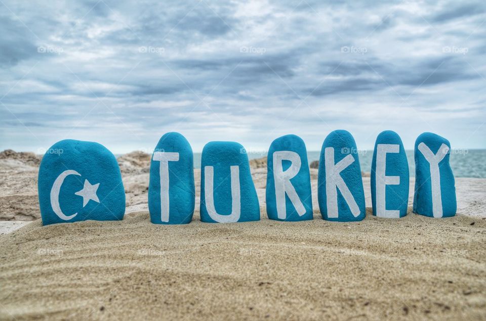 Turkey nation on turquoise painted stones