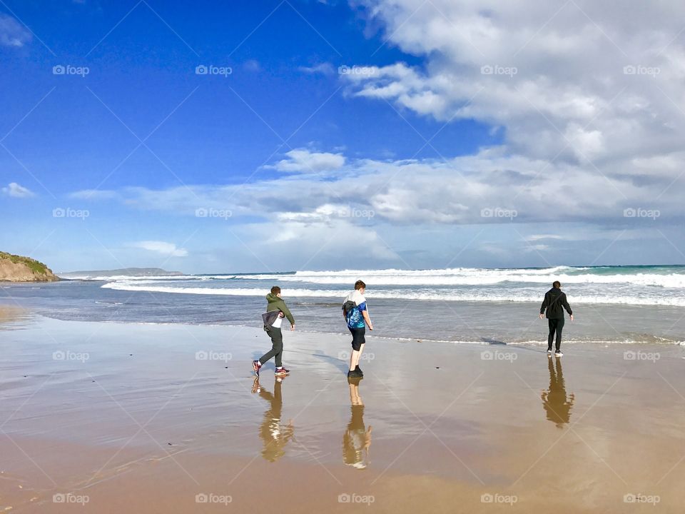 Boys having fun at the beach. 