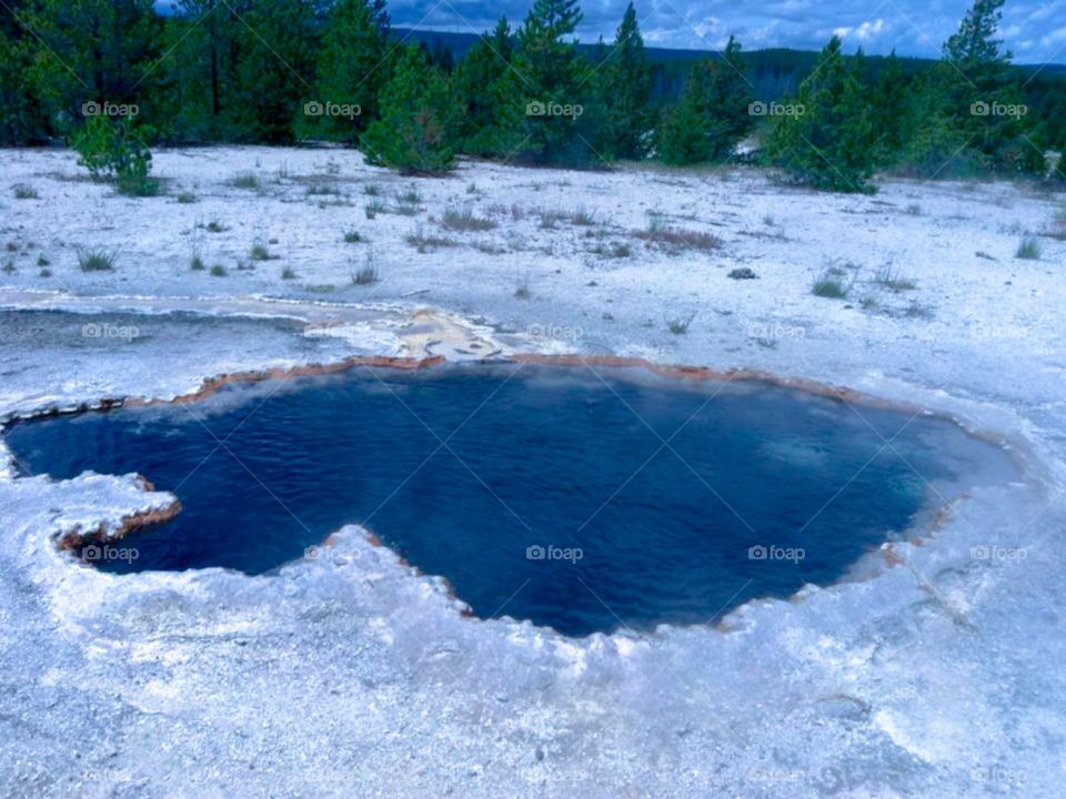 Photo taken at Yellowstone Nation Park. The shape of the pool reminds me of the House Stark sigil in Game of Thrones. 