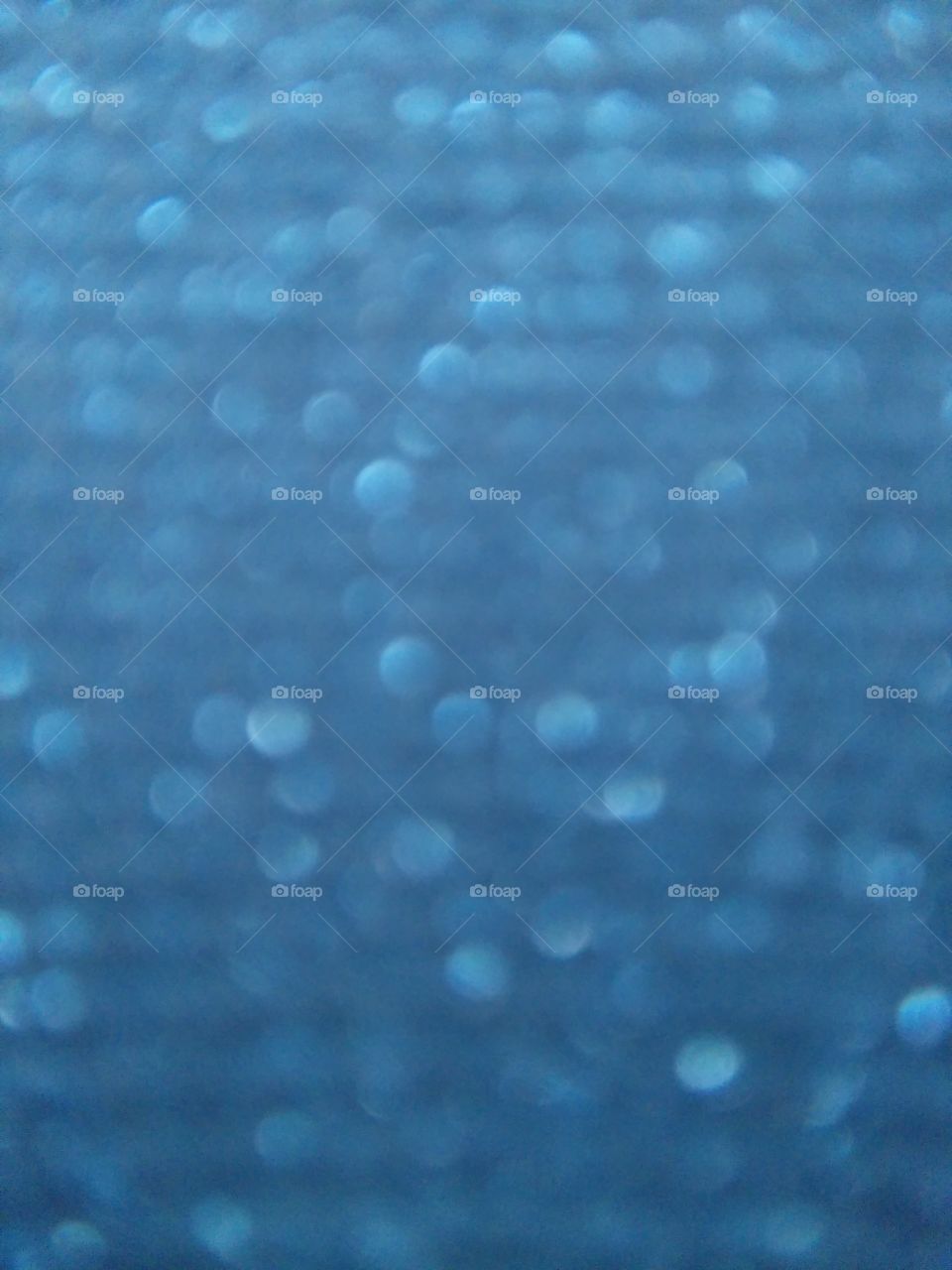 Full frame of blue bokeh background