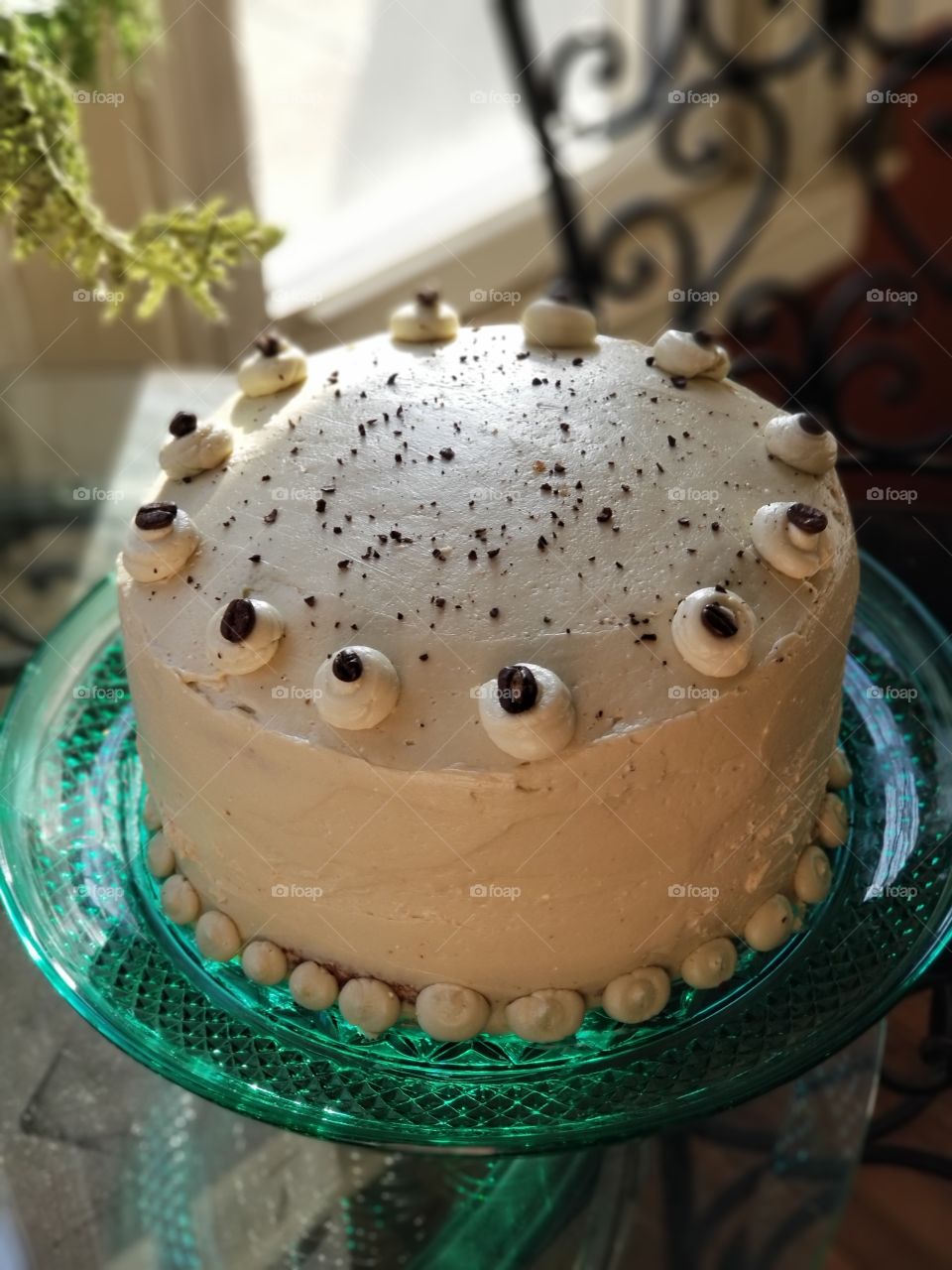 Decorated layer cake with espresso beans