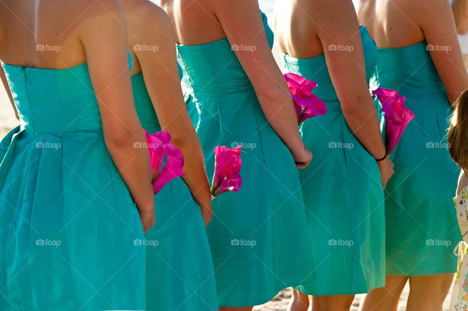Bridesmaids at a beach wedding 