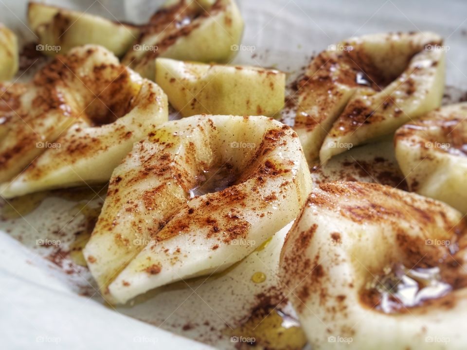 Pears with Cinnamon Being Prepared to Bake
