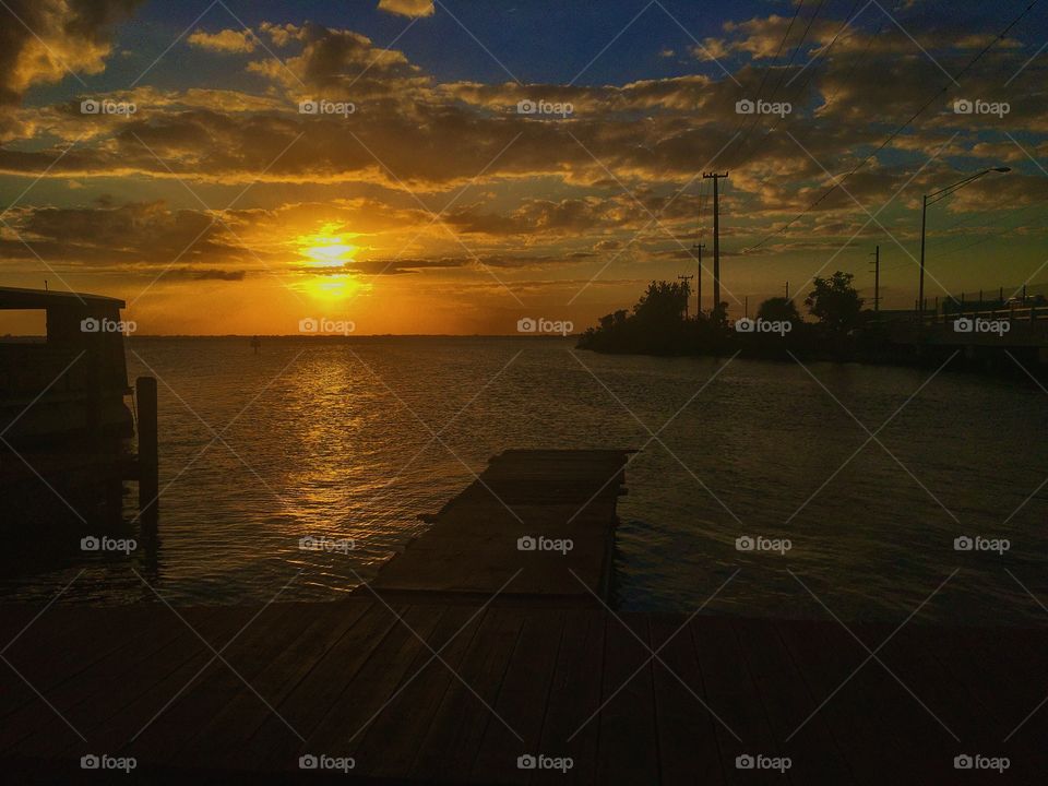 As the sun meets the horizon, so the world dares to dream 