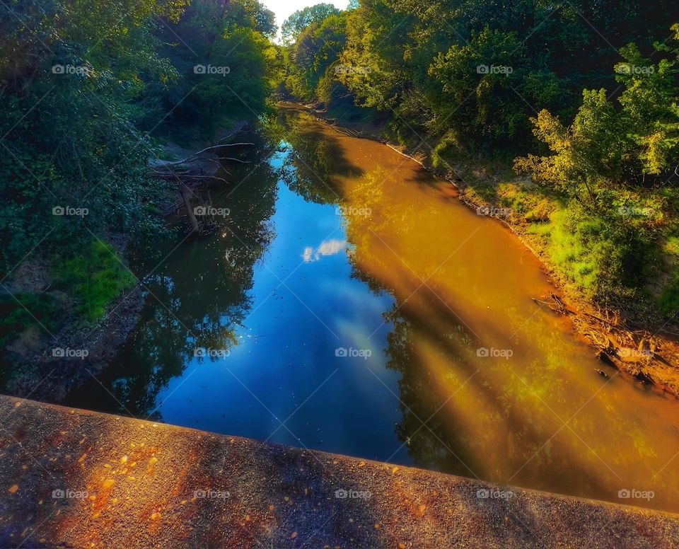 The Big Black River flowing southwest towards the Mississippi River on a sunny, cool afternoon.