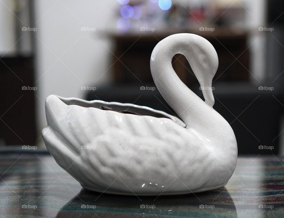 white swan decoration on the table - decoration