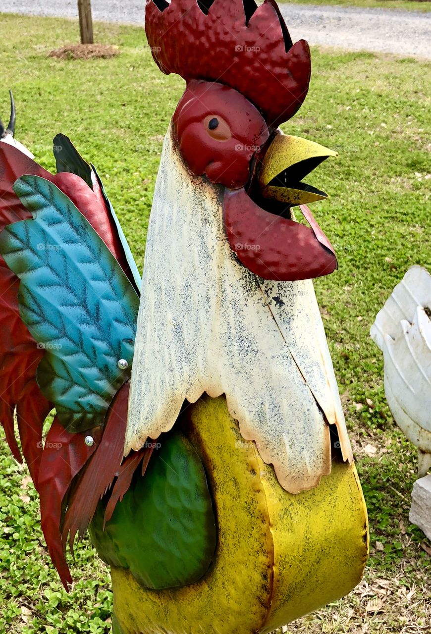 Metal folk art rooster lawn ornament 