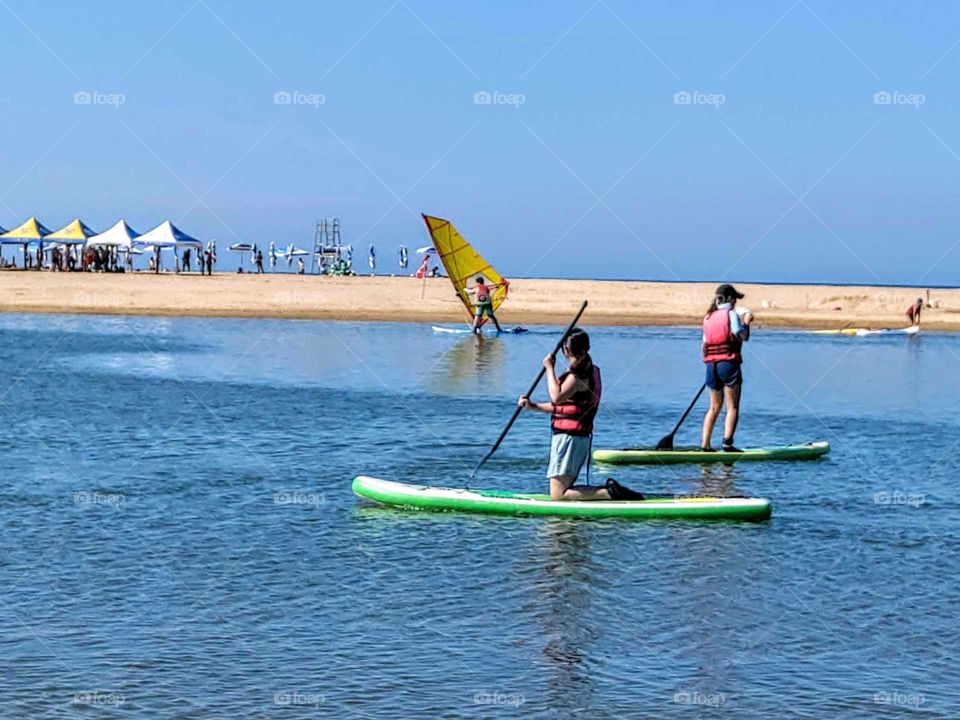 It's summertime!: water activities in summer beach. a challenge sport but also enjoying happy leisure vacation.