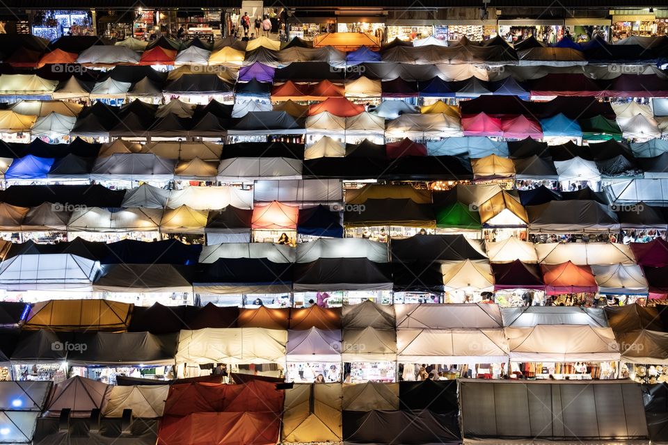 Summer is colorful time to go out all day celebrate , Colorful tents at The famous Thai night flea market , Ratchada market