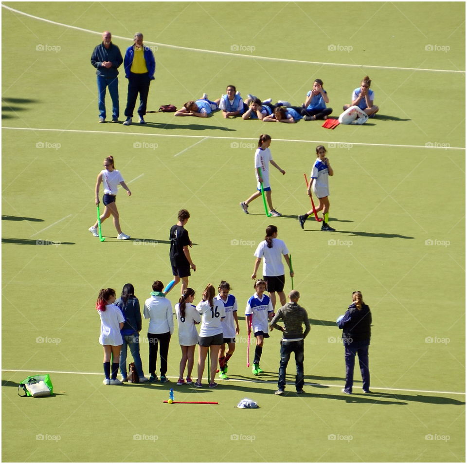 Field hockey. the girls are getting ready to start a game