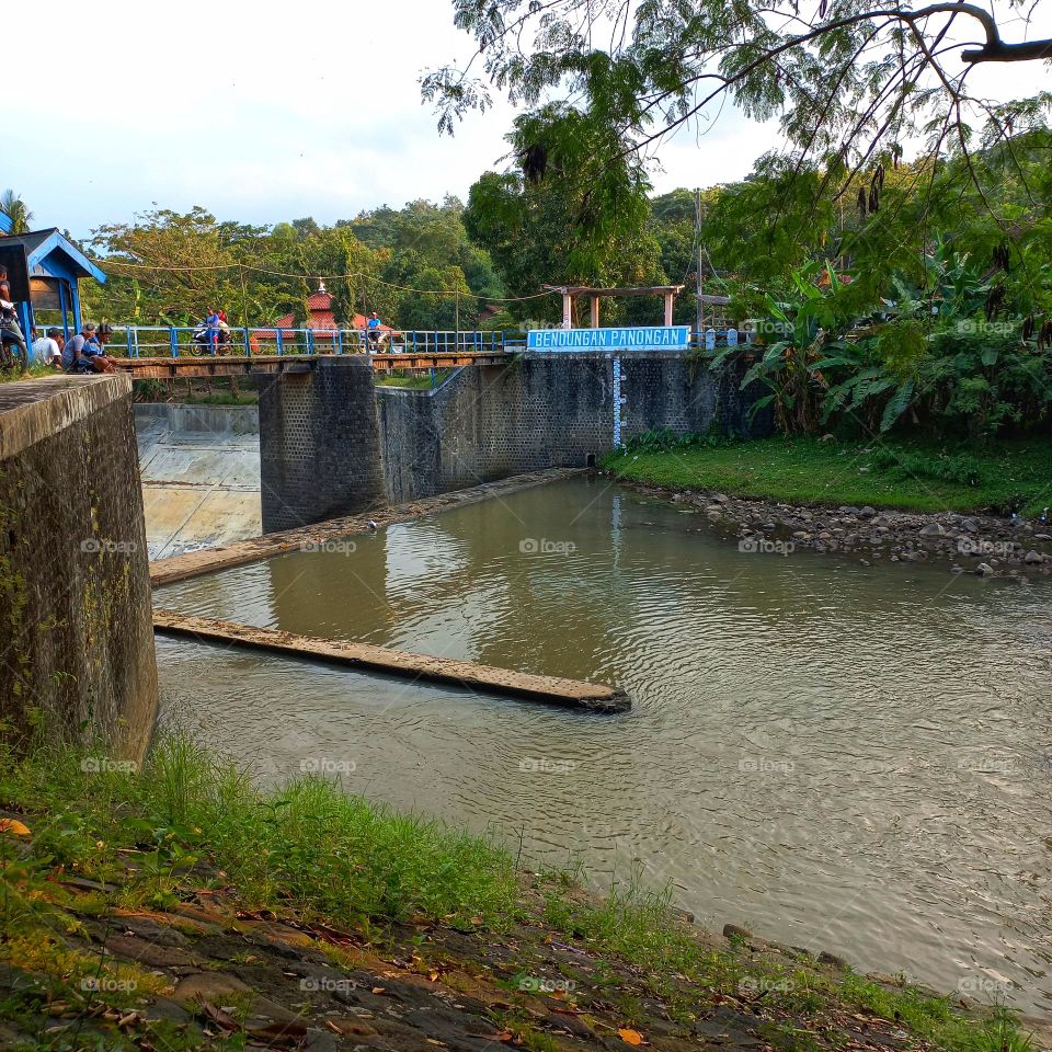 River dam connecting between villages