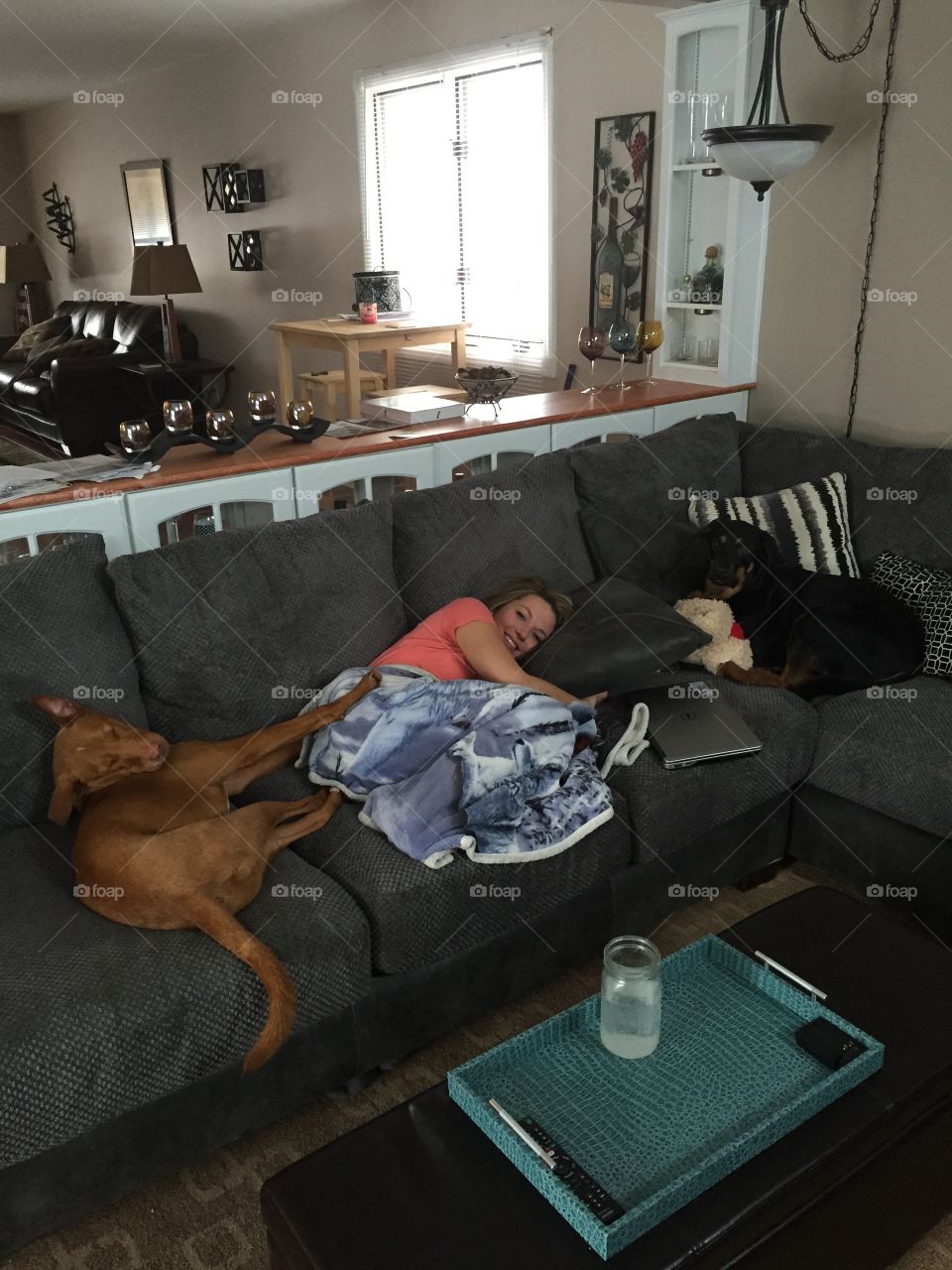 Woman sleeping with dog