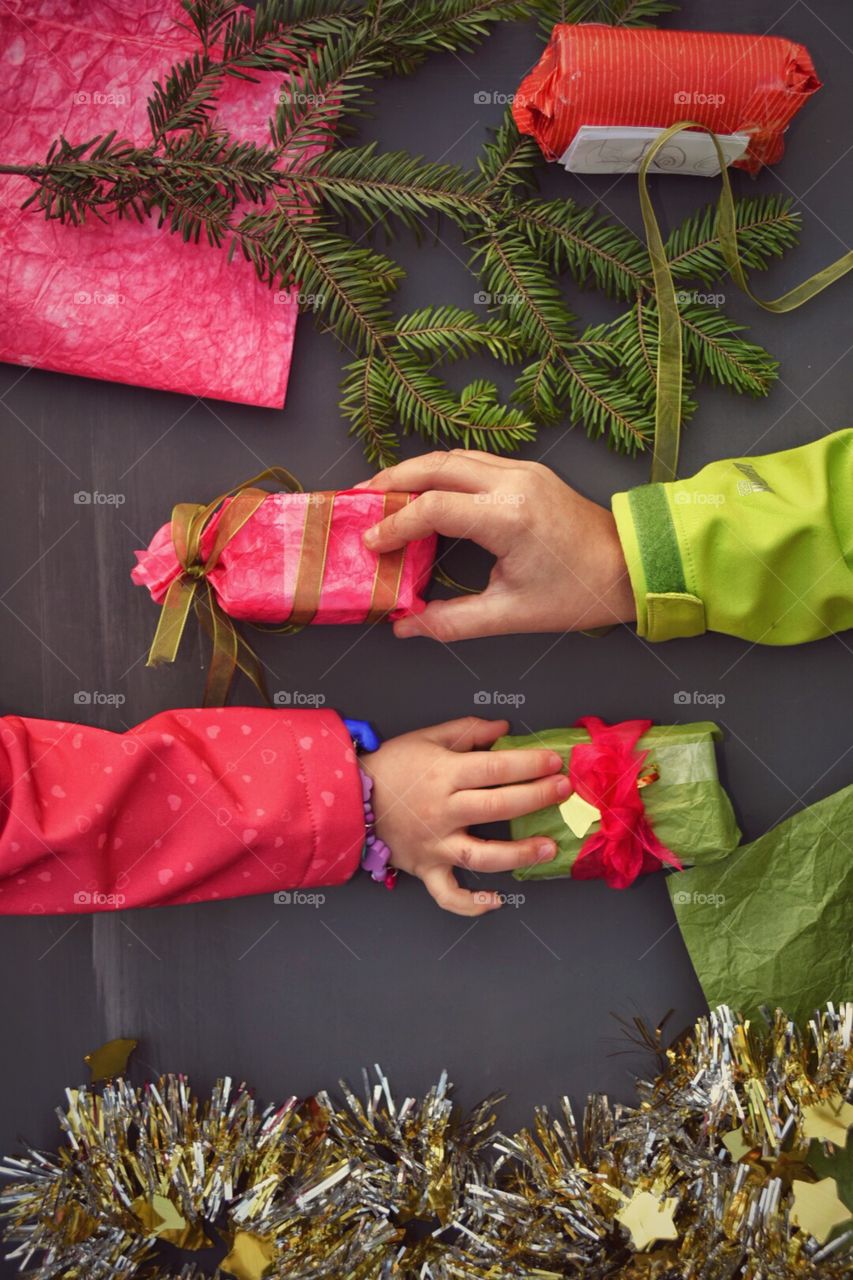 Boy and girl changing gifts