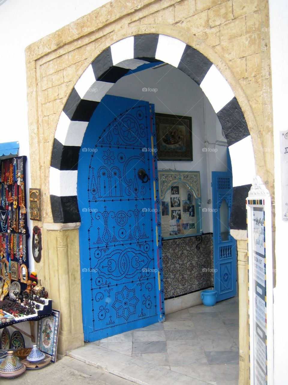 Blue door wide open, beautifully decorated