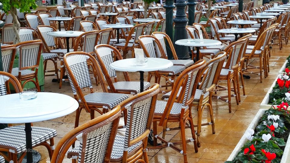 Empty chairs of cafe de Paris in Monaco.