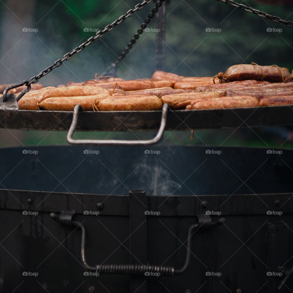 Sausages on barbecue grill