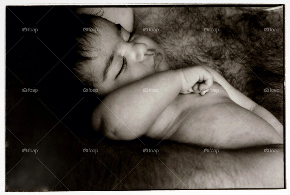 baby sleep newborn father by jbrinkler