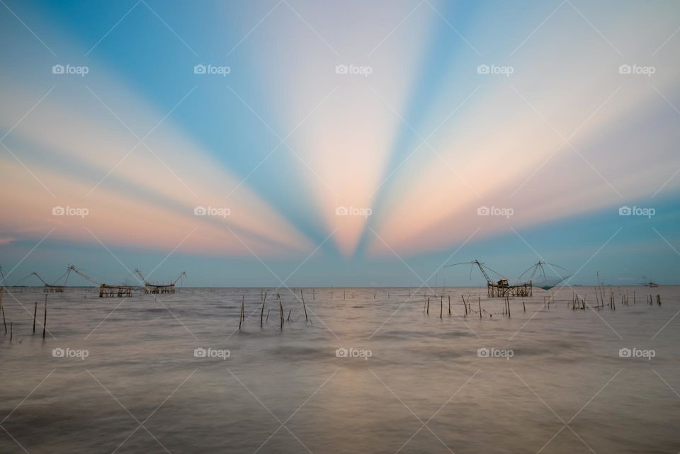 Wondefful sunset light moment above big fish trap in Thailand