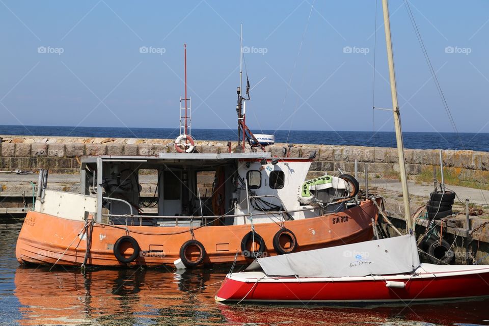 Fishing boats in a small harbor