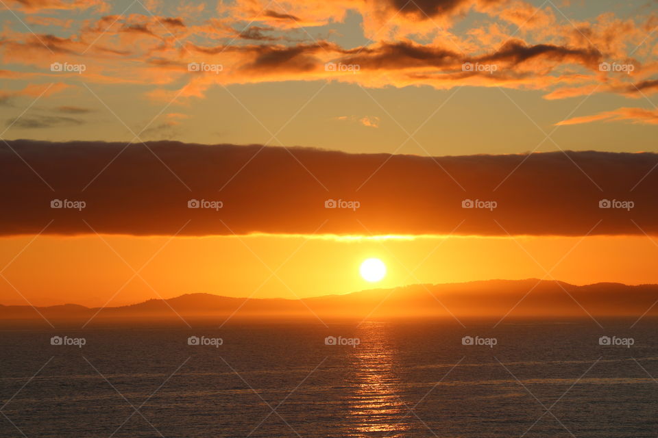 Amazing sunset by the shore