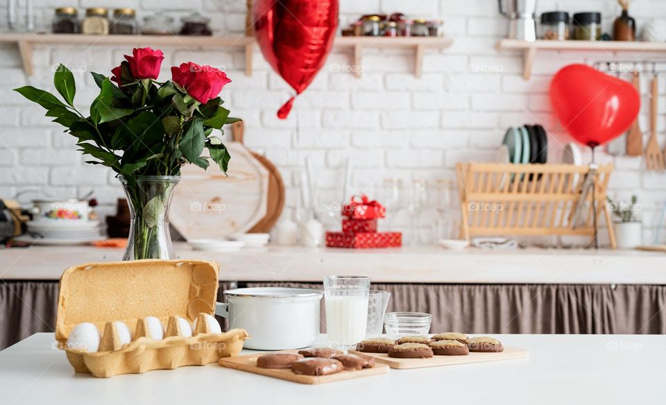 cooking heart shaped cookies at the kitchen