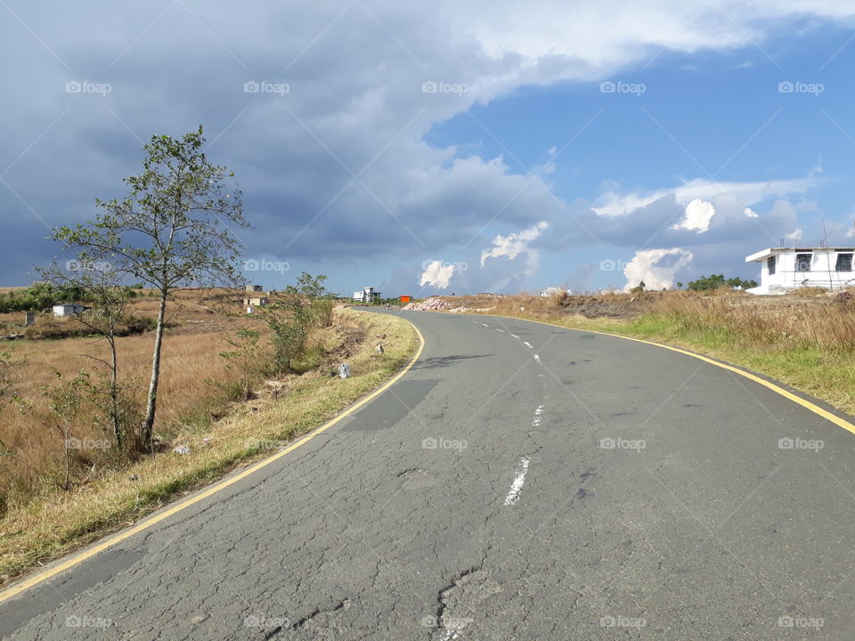 road. indian road. assam road. shillong road. meghalaya road. nature. sun. sky. tarvel. tree. green tree. highway. lindin highway. north east highway. traveling system