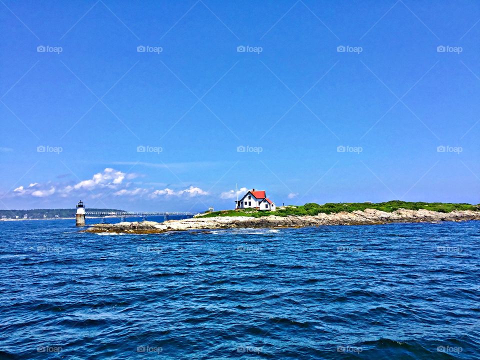 Landscapes of 2019 / Foap Missions - A spectacular view of a lighthouse and cabin off the Maine Coast around Cabbage Island