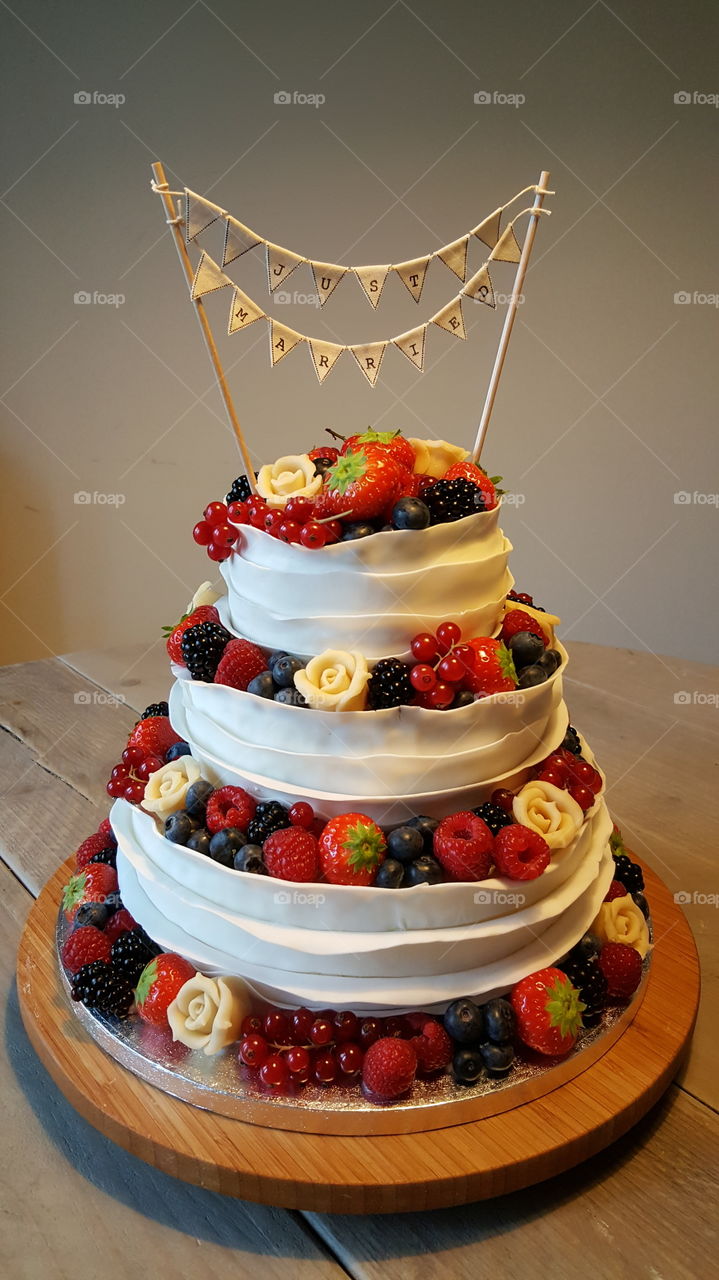 Red fruit wedding cake