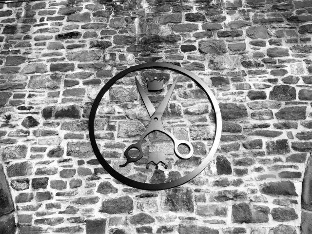 A Circle , Crown and Scissors