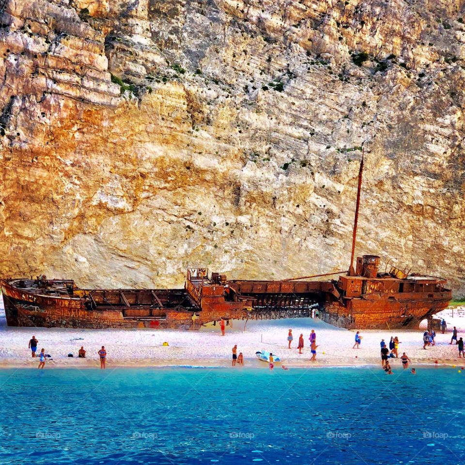 The incredible shipwreck beach. Legend goes pirates were smuggling liquor and women when a storm hit so they docked here to weather the storm. The shop ended up washing a shore and is left for all of us to now explore. 