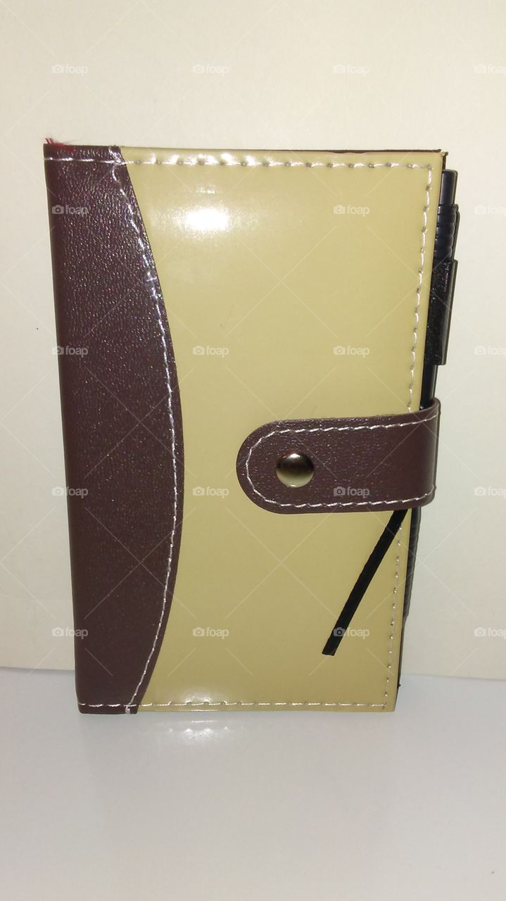 brown & tan notebook