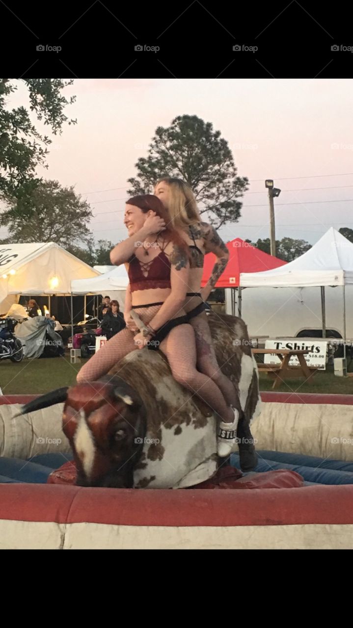 Two girls. One bull.