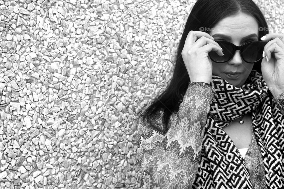 Black and white poetret with woman wearing sunglasses